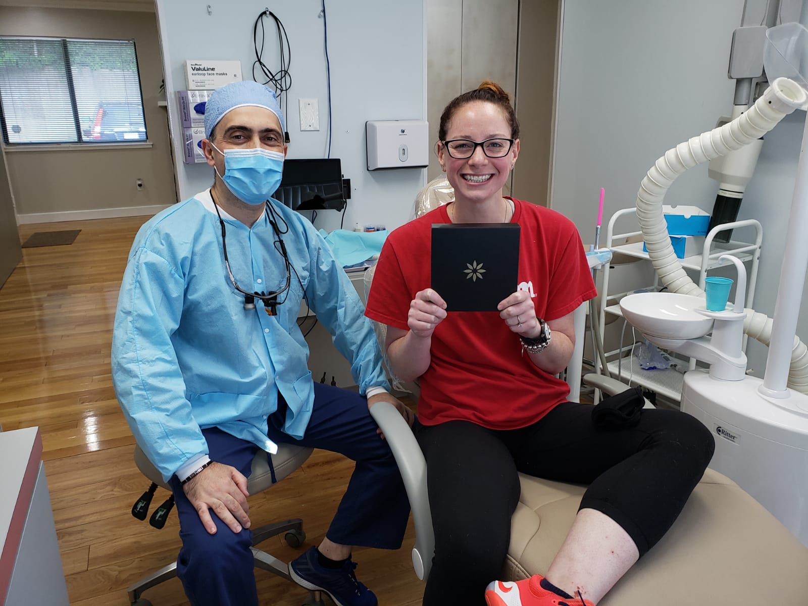 happy patient with invisalign aligners